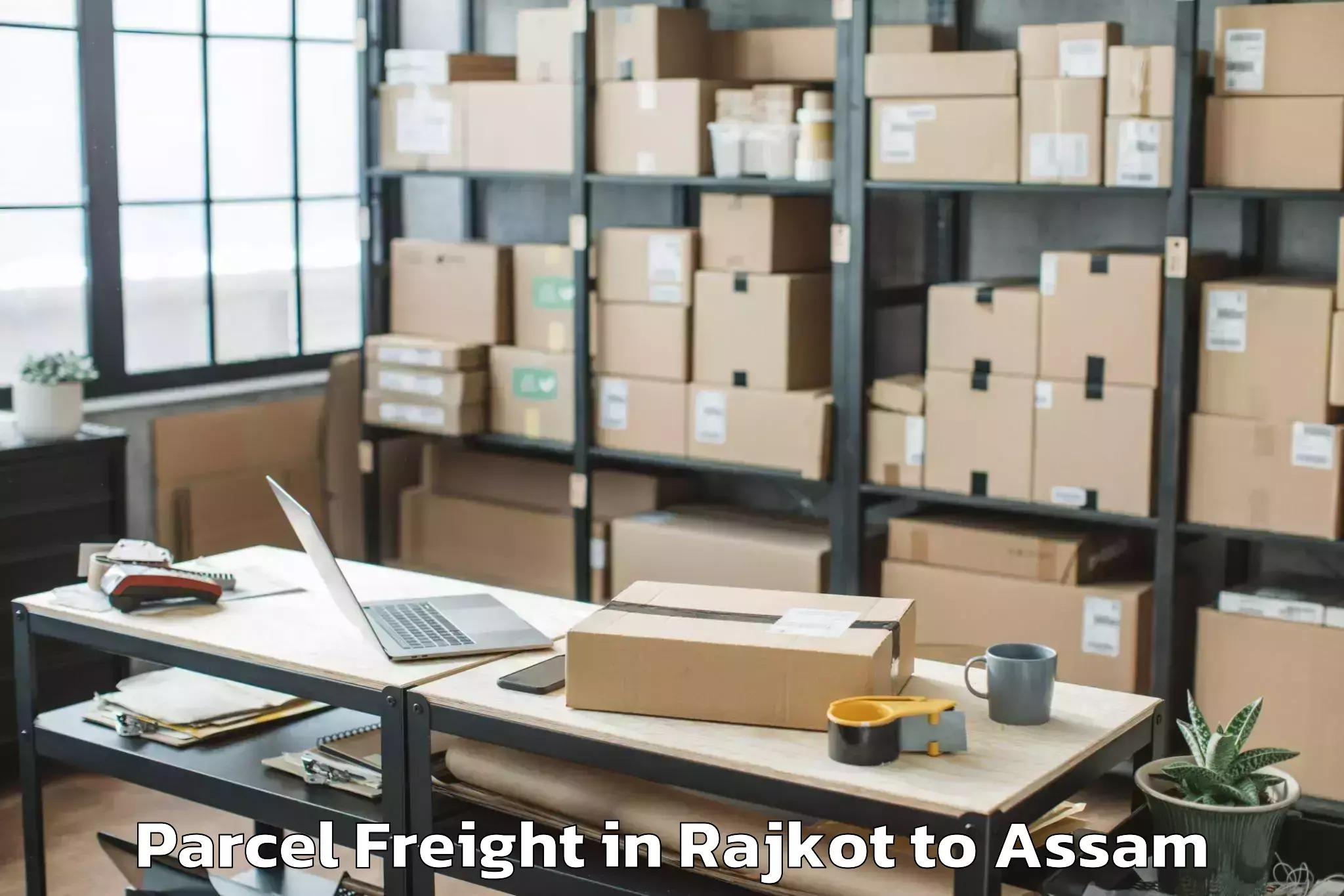 Easy Rajkot to Balijan Parcel Freight Booking